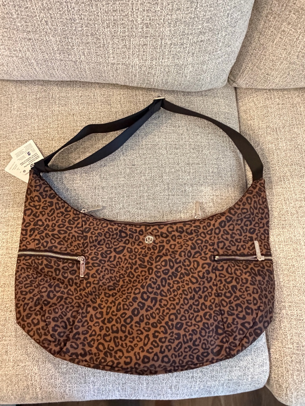 Lululemon Large Slouchy Sling Bag 13L
Metal Hardware leopard print NWT - Picture 5 of 14